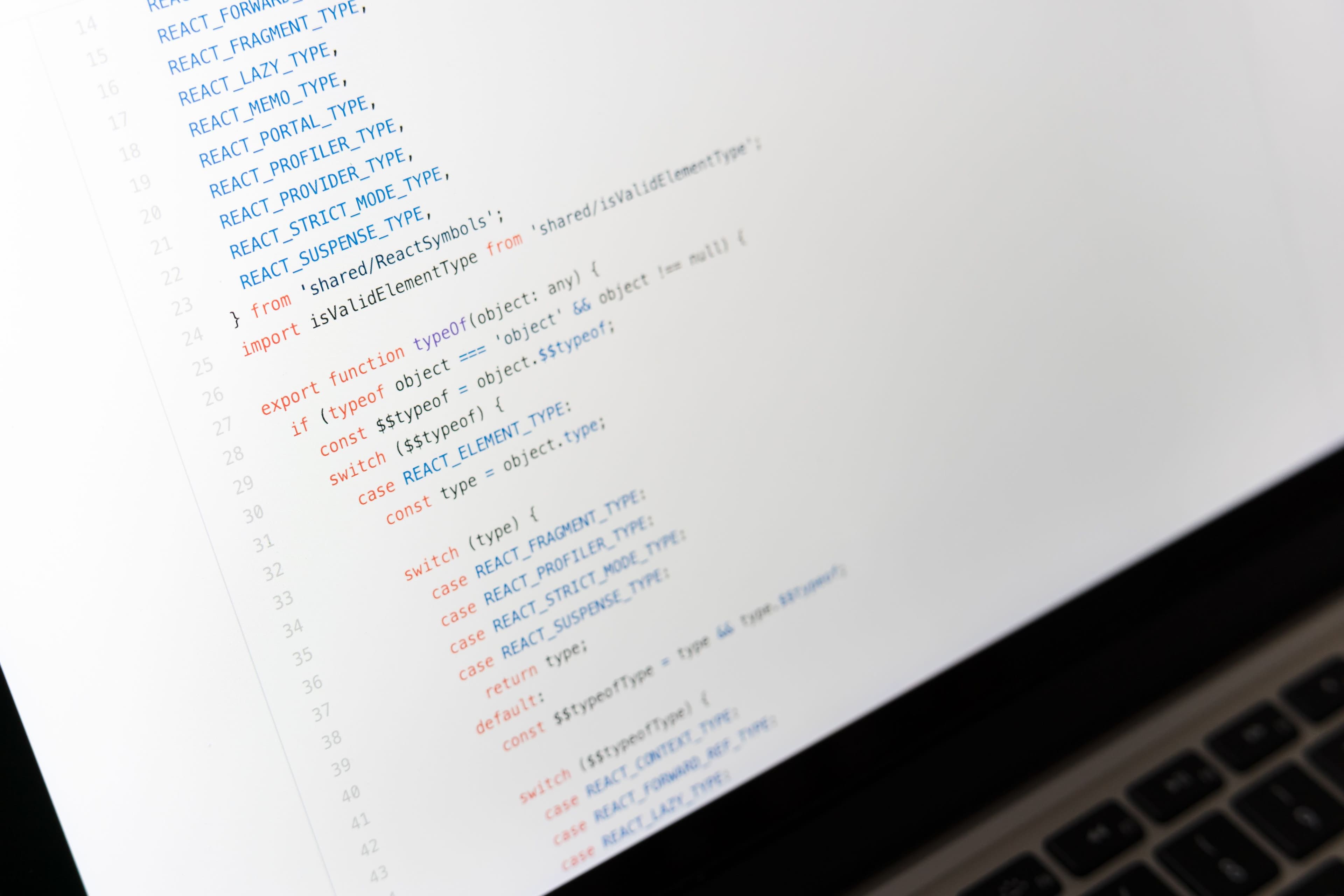 Close-up of JavaScript code on a laptop screen, showcasing programming in progress. @Markus Winkler